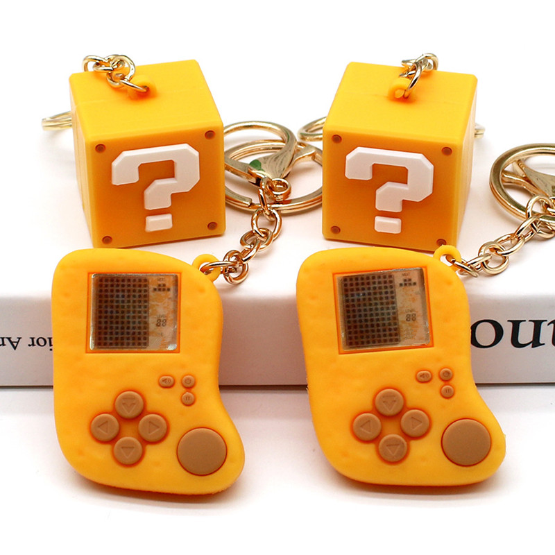 Creative Simulation Question M - مراجعة Gaming Console Keychain وسعره