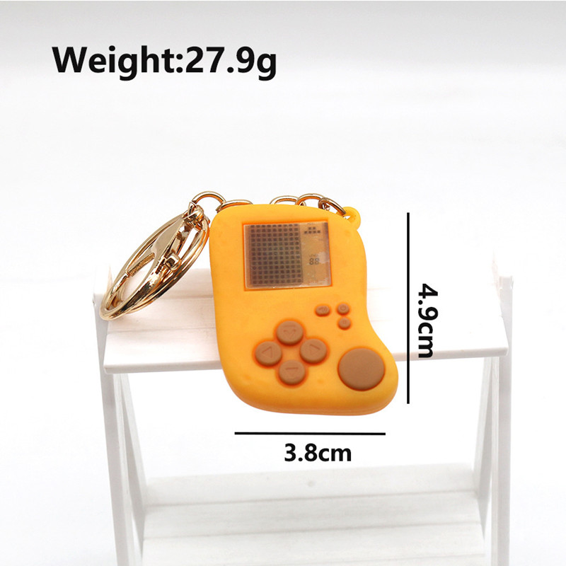 Creative Simulation Question M - مراجعة Gaming Console Keychain وسعره