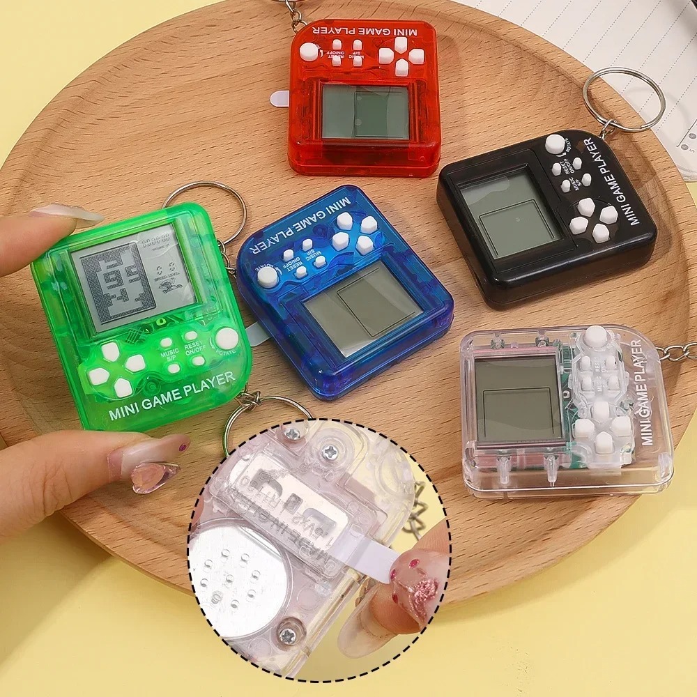 Portable Mini Handheld Game Pl - مراجعة Gaming Console Keychain وسعره