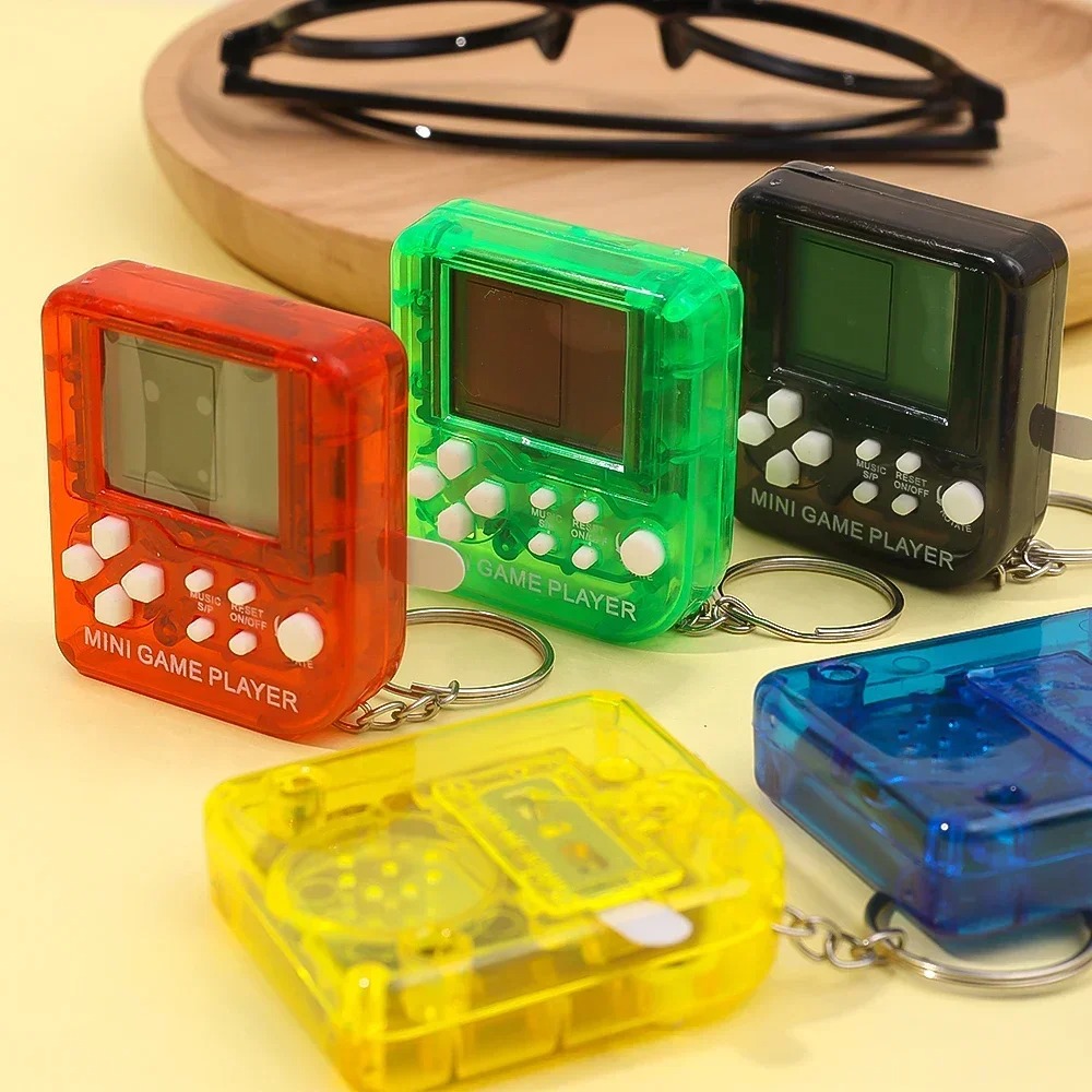 Portable Mini Handheld Game Pl - مراجعة Gaming Console Keychain وسعره